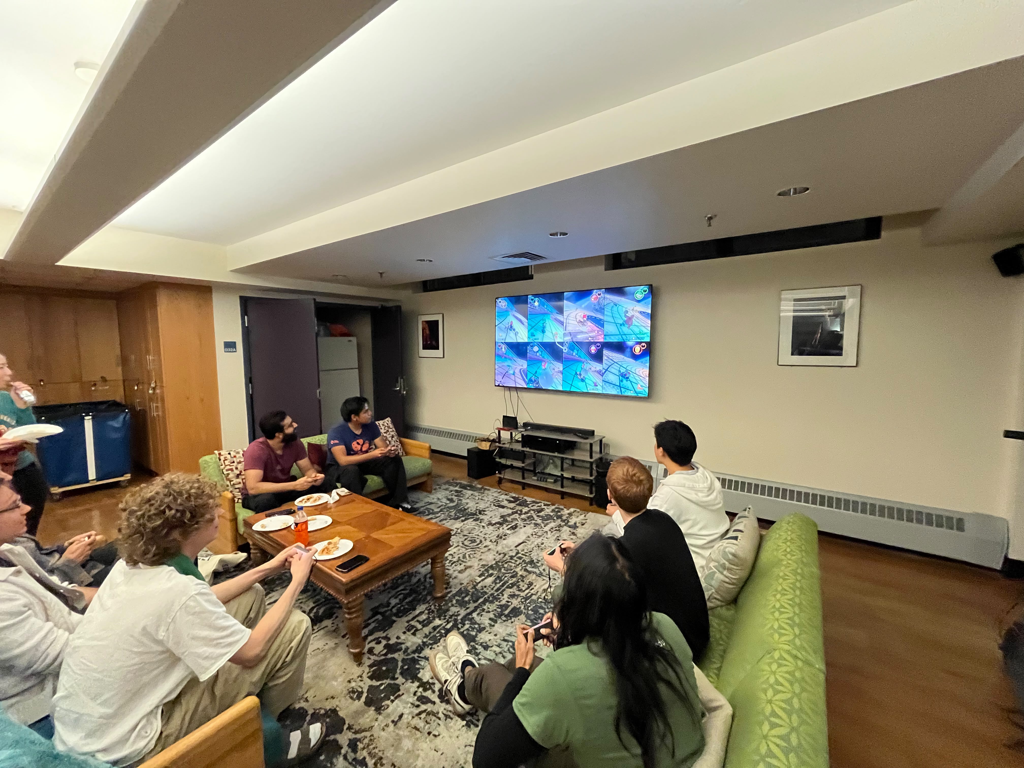 Residents playing a multiplayer Mario Kart race in the Edgerton Large Lounge