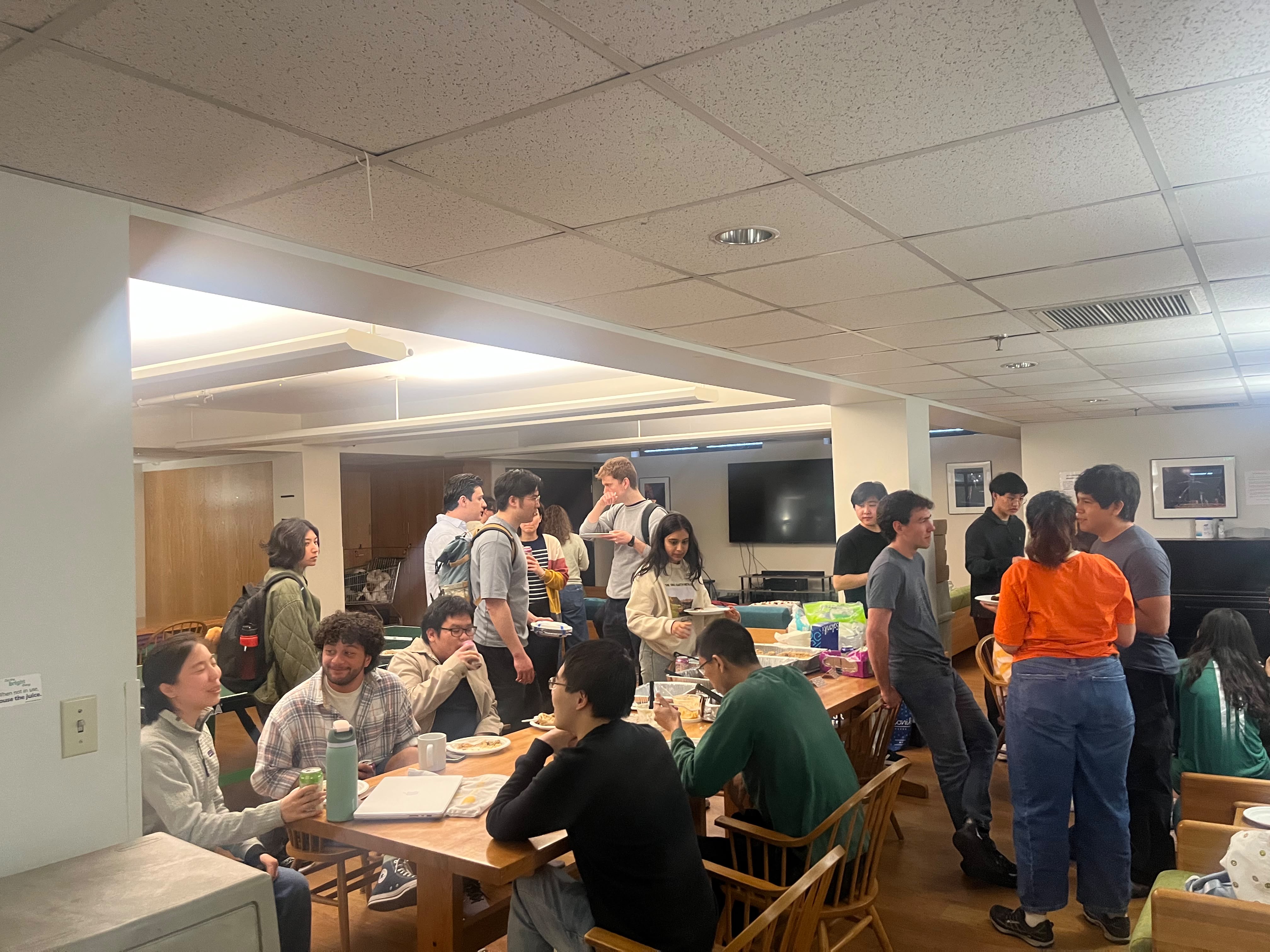 Residents talking and sharing food at the study break